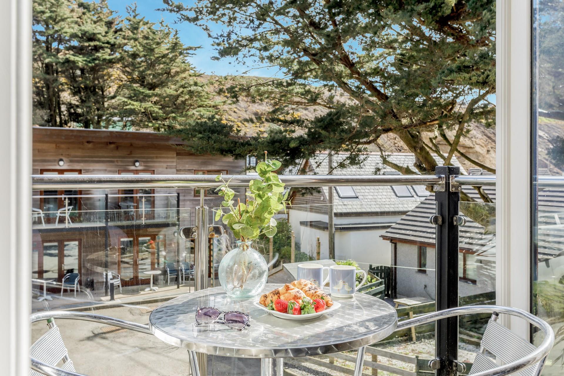 Sip your morning coffee out on the balcony.