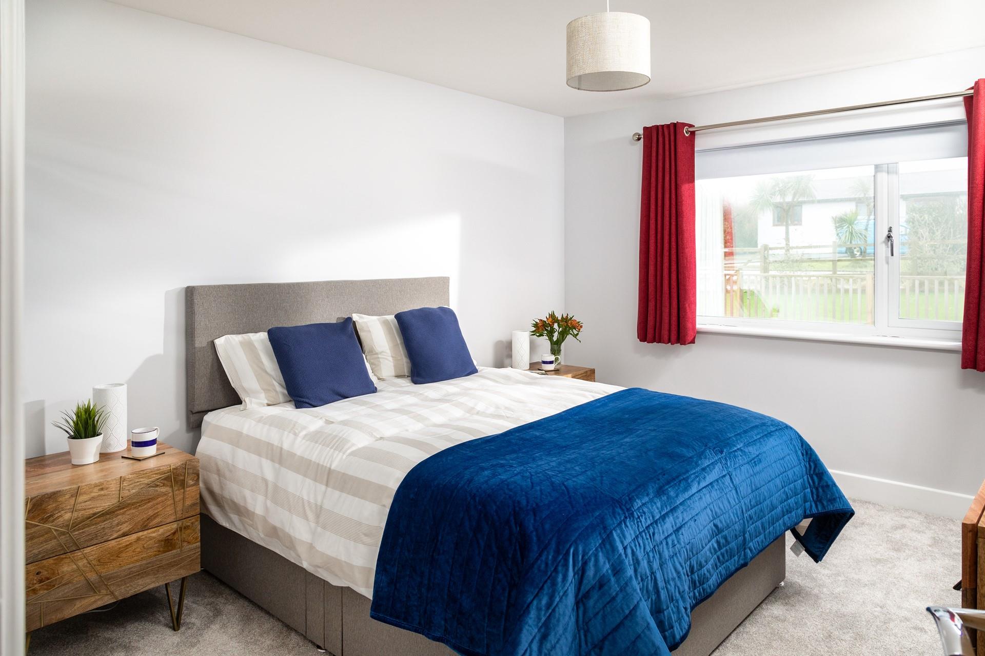 Bedroom 2 has a spacious king size bed for drifting into a peaceful night's slumber.