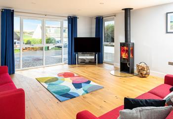 Bright and spacious, the sitting room is the perfect space to relax and unwind, light the woodburner and enjoy the far-reaching views. 