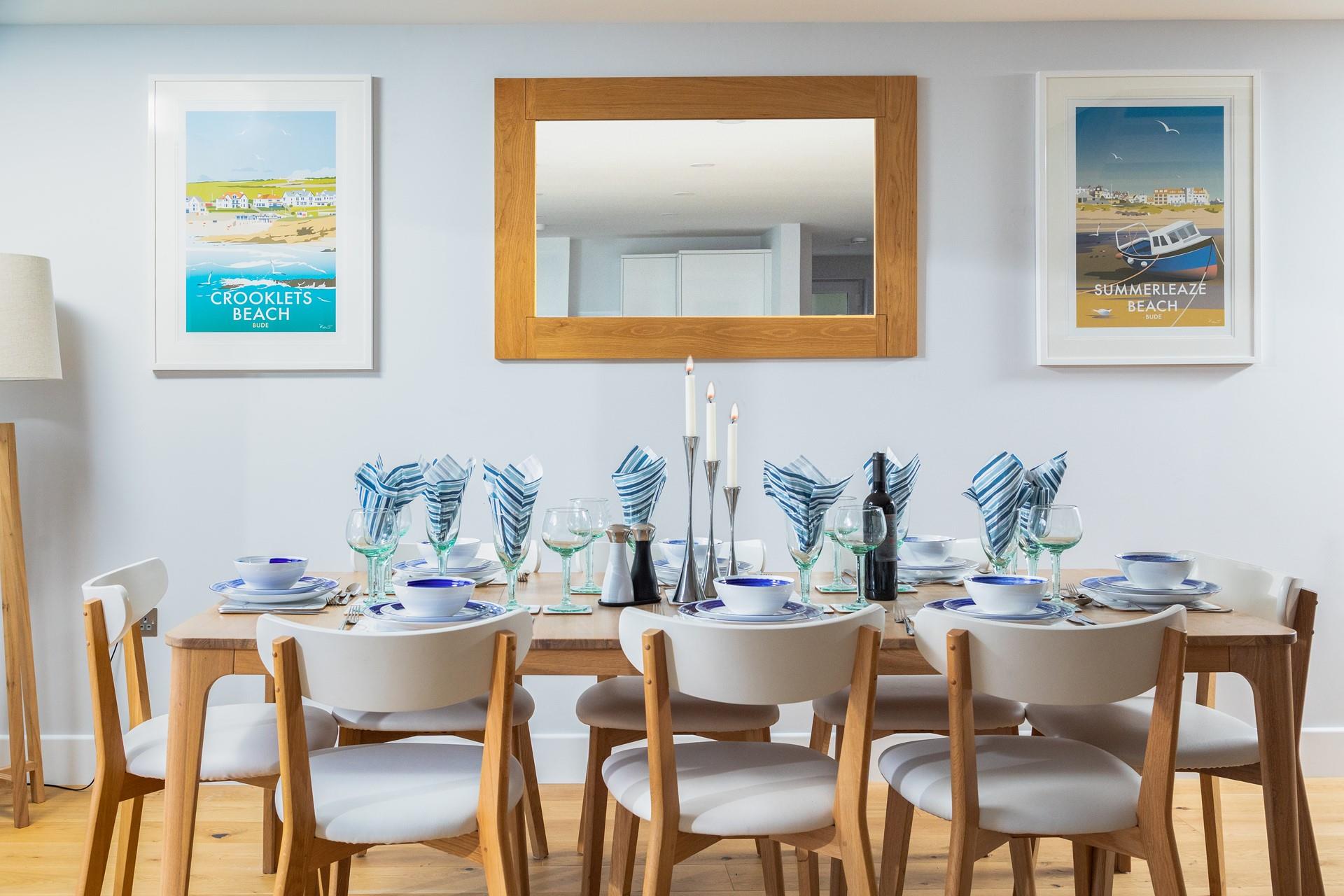 We love the Bude-inspired artwork on the walls of the dining area.