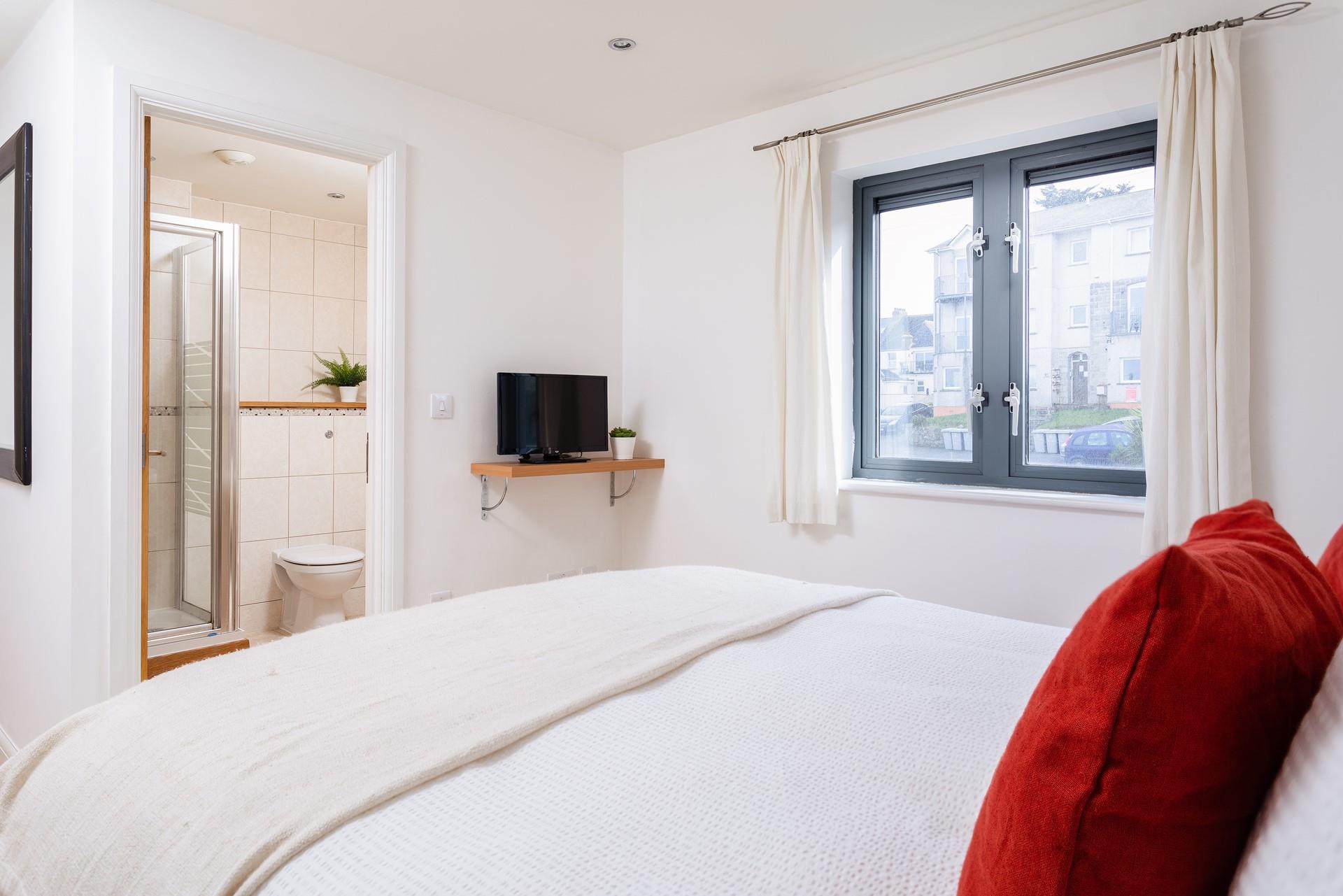 An en suite shower room in the master bedroom makes getting up and ready for the day much easier.