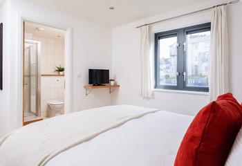 An en suite shower room in the master bedroom makes getting up and ready for the day much easier.