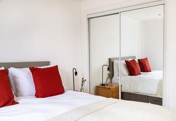 Sink into the sumptuous bed after a day exploring Newquay. 