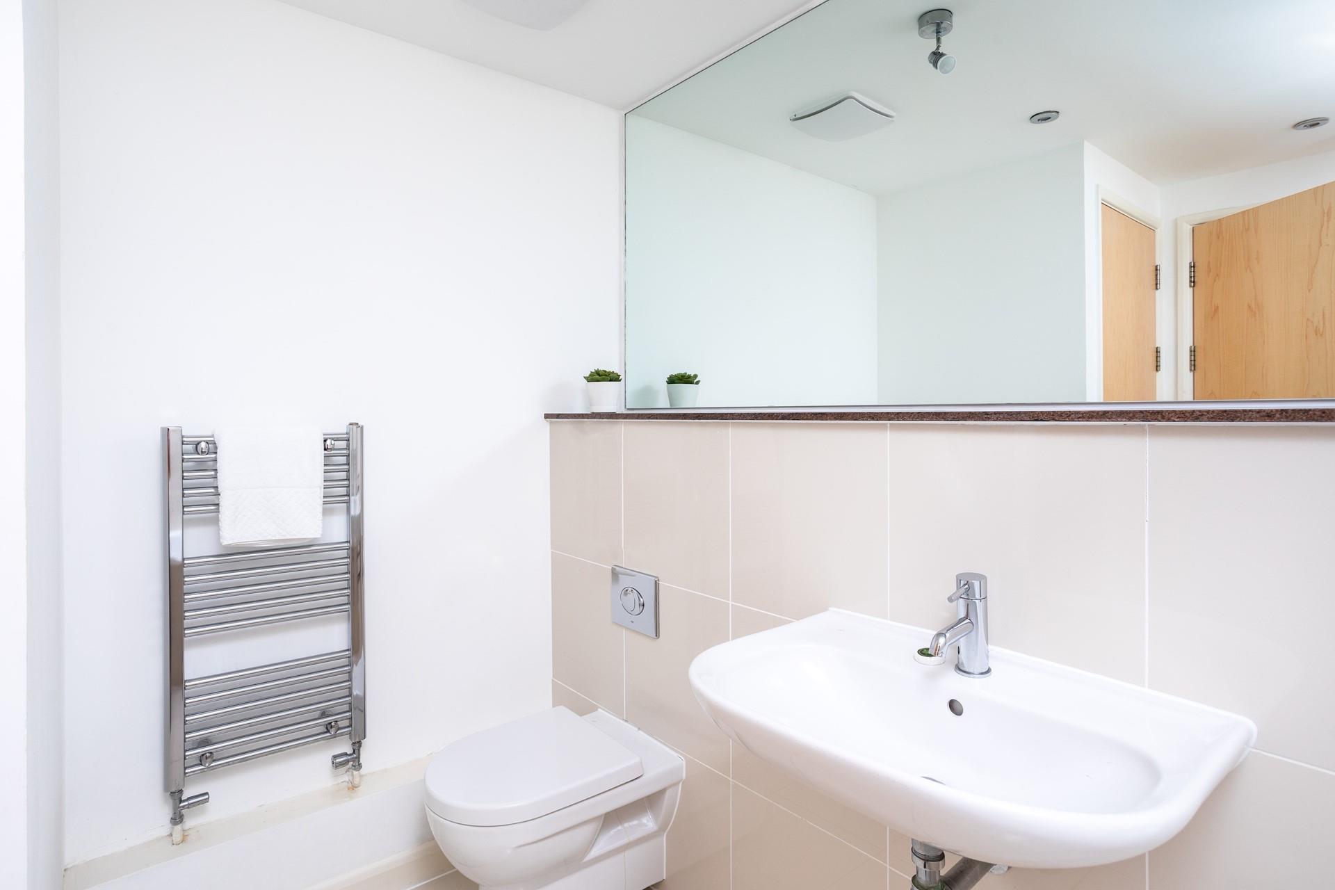 The large mirror is perfect for getting ready for an evening out. 