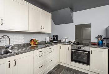 Fully-equipped, the kitchen has all you need for your stay at Number 6. 