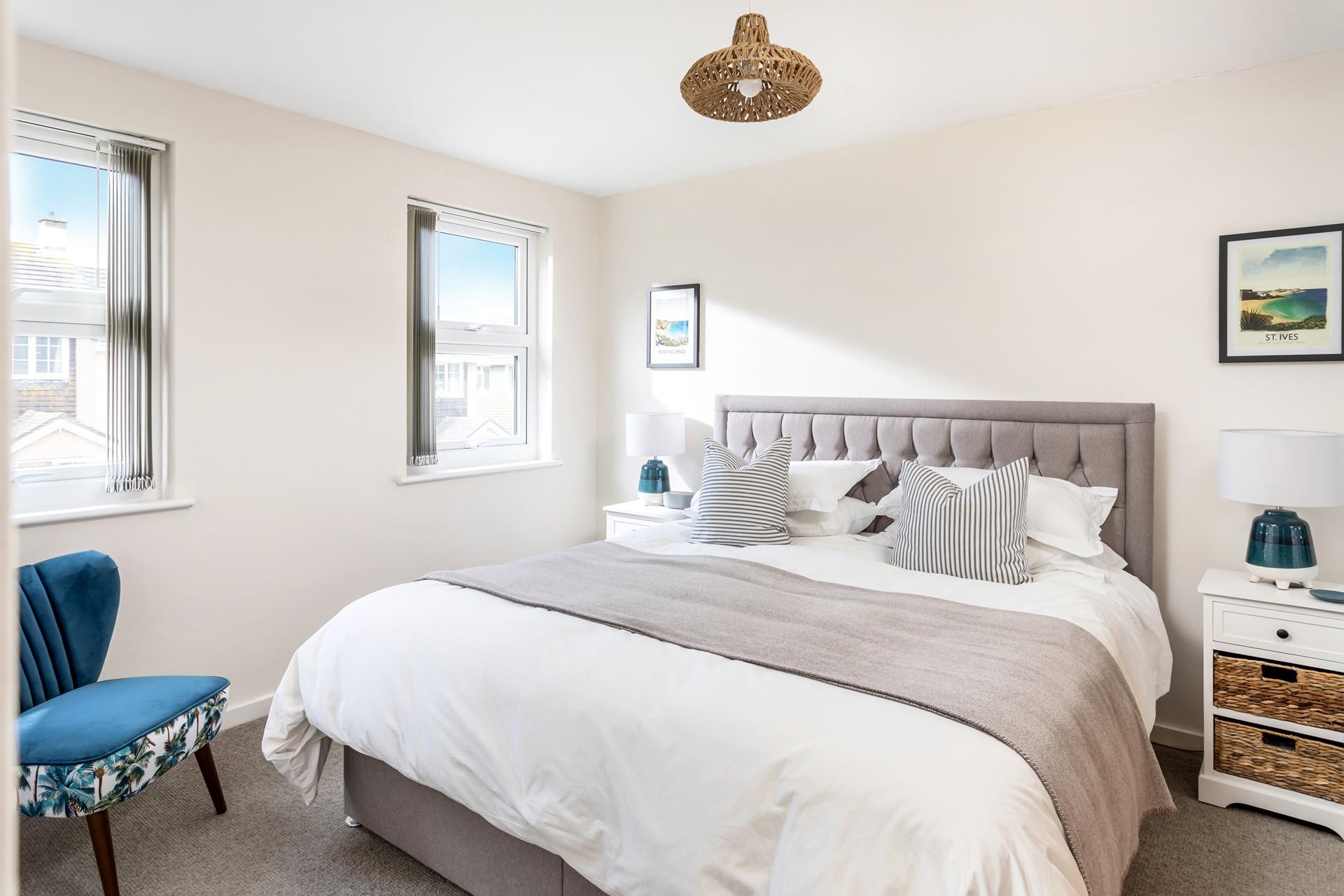 Carefully chosen décor and soft furnishings create a relaxing vibe in bedroom 1. 