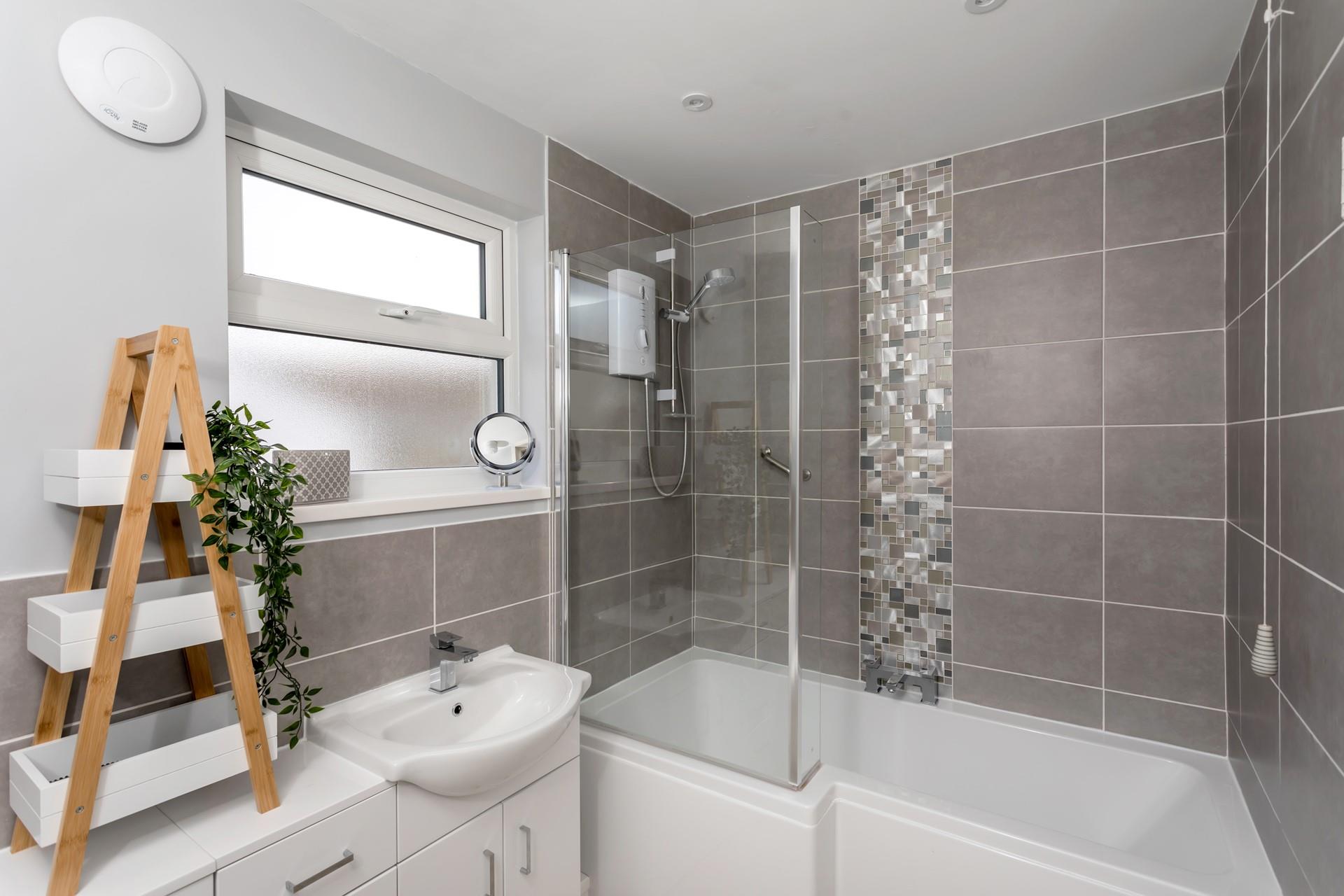 Modern and stylish, the bathroom is the perfect place to unwind after a busy day exploring the north coast. Run the bath and...relax.