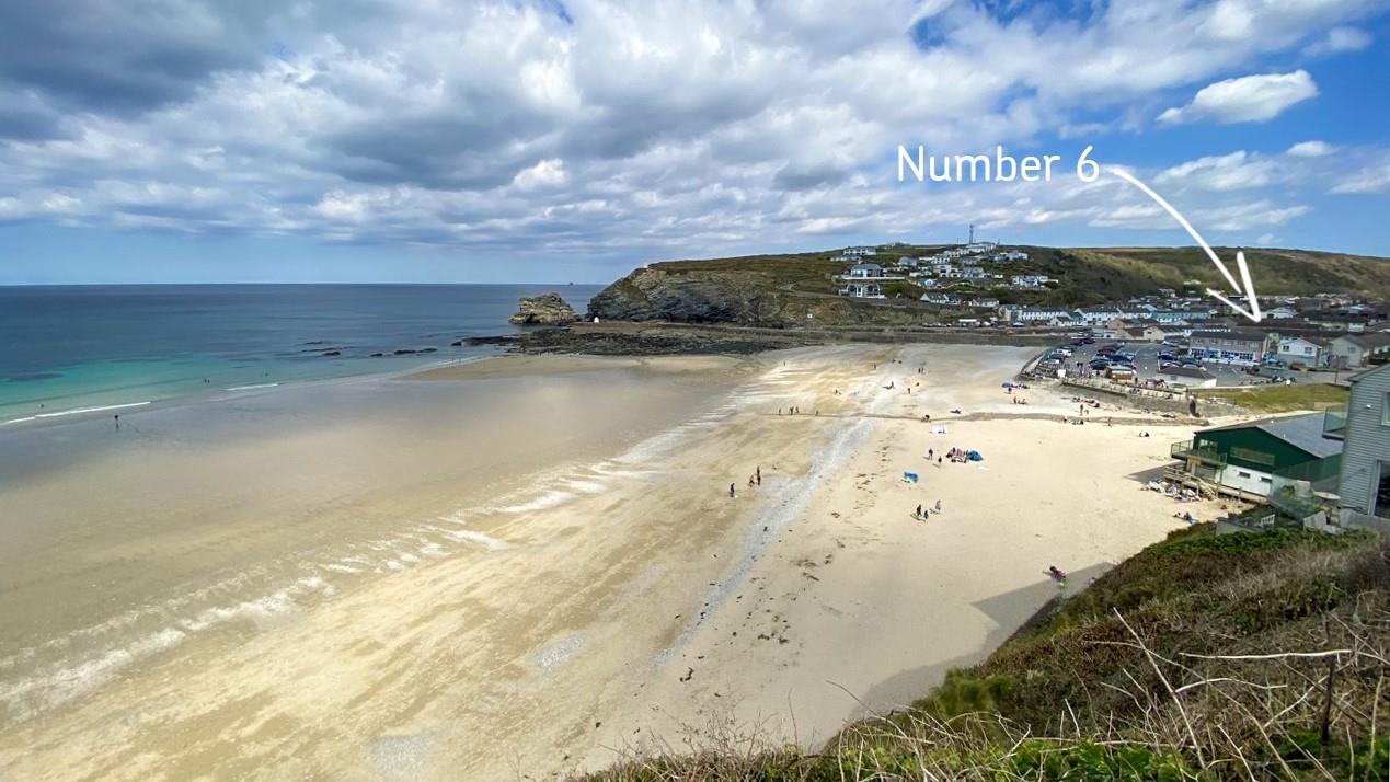 Number 6 is ideally located just steps away from the beach.