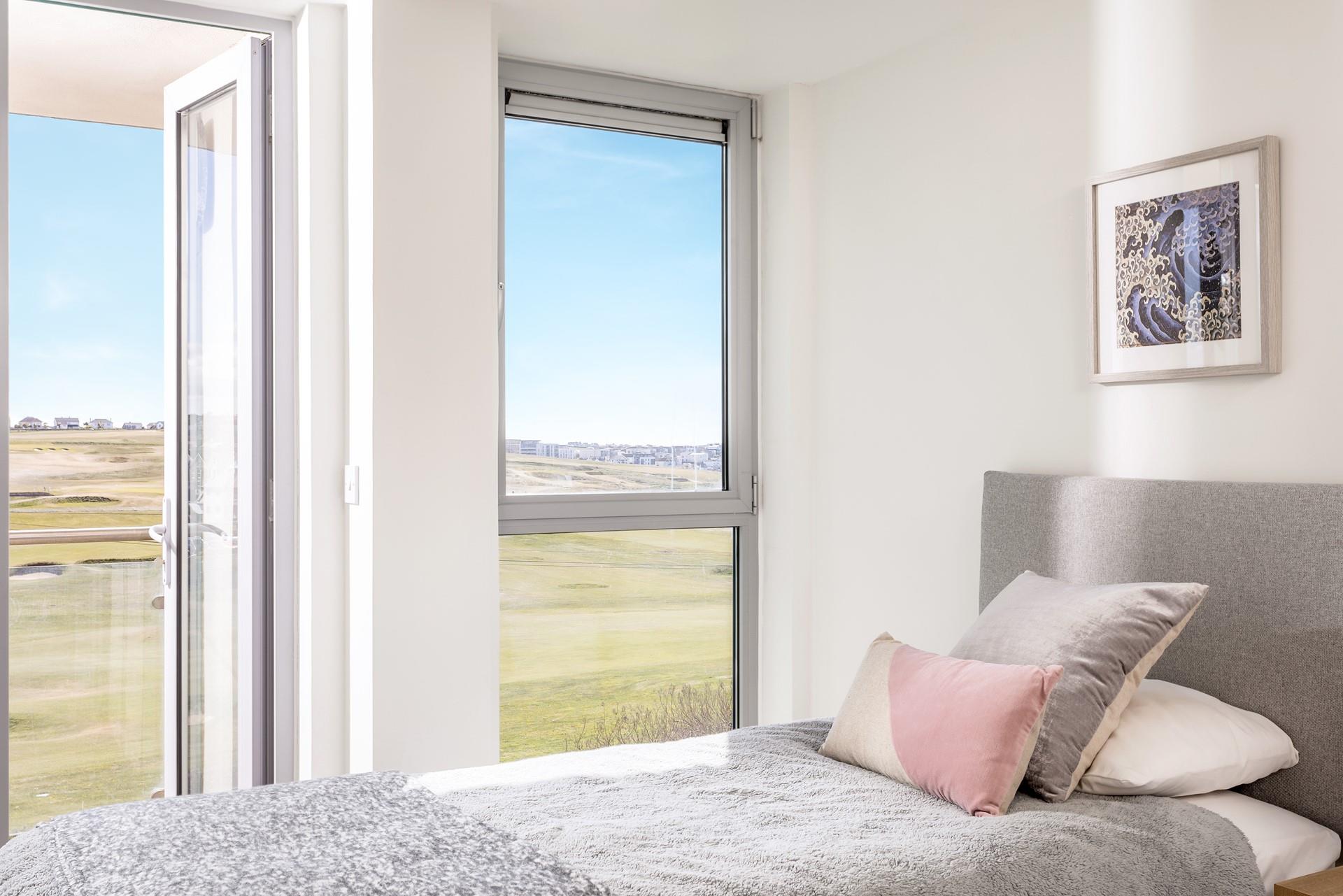 Both bedrooms have adjoining access to a second balcony, so you can step out in the morning and enjoy the surrounding views. 