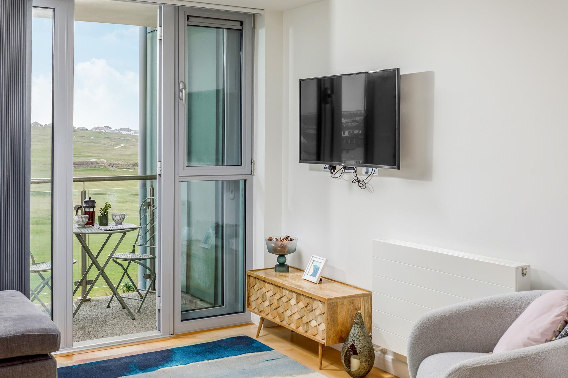 Enjoy a family movie night in the sitting room.