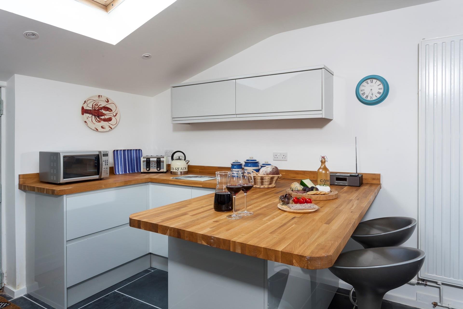 Fairing Cottage has a great space for cooking and conversation. 