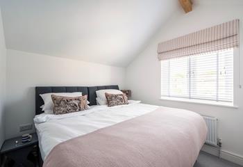 Bedroom 2 has zip and link beds so this cottage is great for families or two couples.