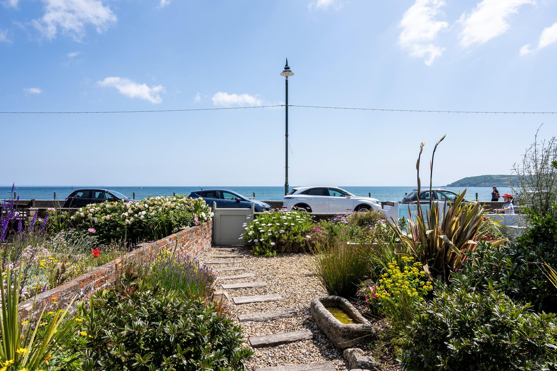 Step across the garden for a morning stroll along Penzance stroll.