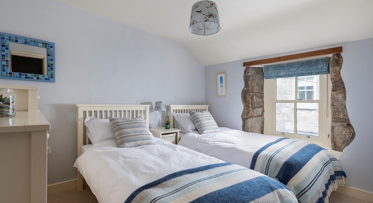 Sumptuous twin beds promise a dreamy night's sleep for guests staying in bedroom 2. 