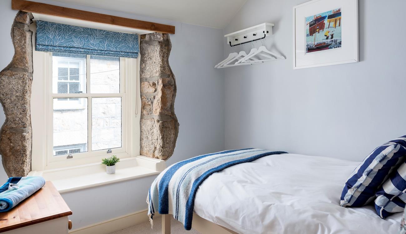 Escape to the single bedroom for a blissful night in this beautifully finished, cosy room.