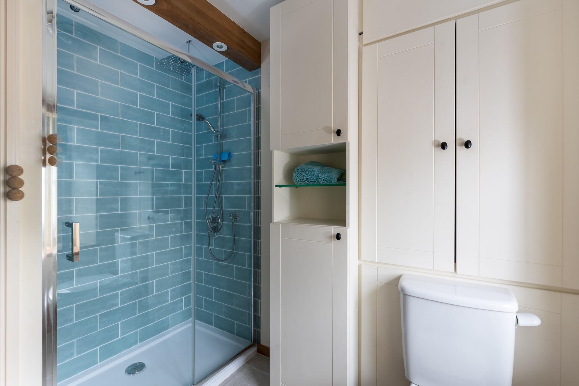 The walk-in shower is perfect for washing off the sand after a day at the beach.