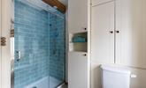 The walk-in shower is perfect for washing off the sand after a day at the beach. - Thumbnail Image
