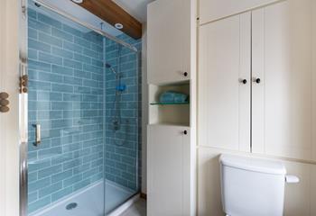 The walk-in shower is perfect for washing off the sand after a day at the beach.