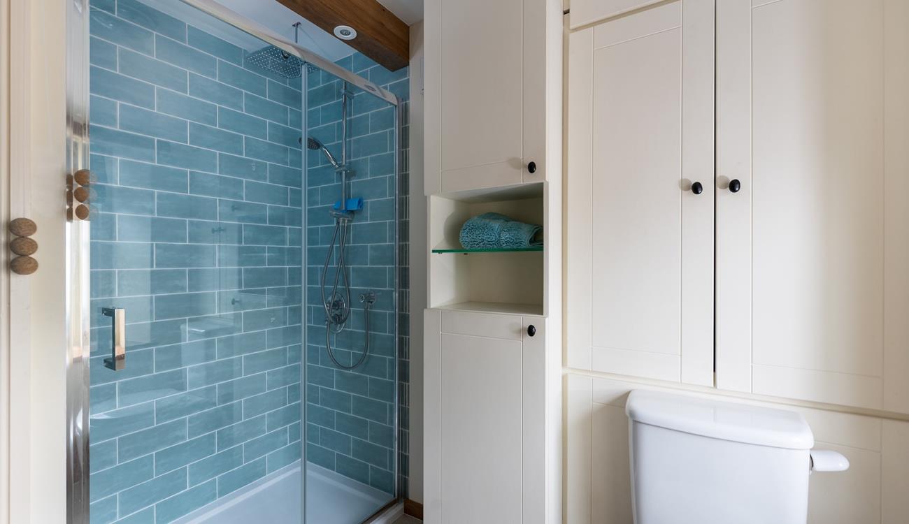 The walk-in shower is perfect for washing off the sand after a day at the beach.