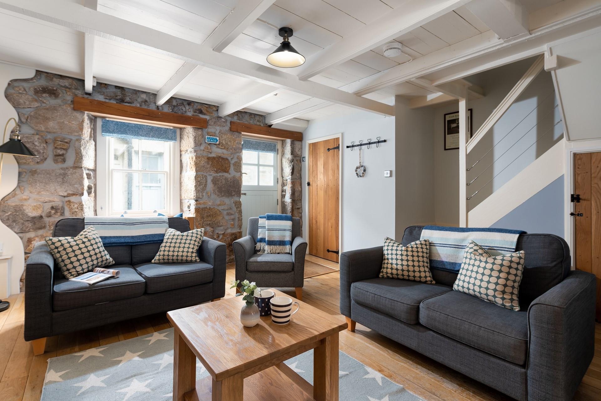 Open up the stable doors and relax with the sea air drifting into the living area.