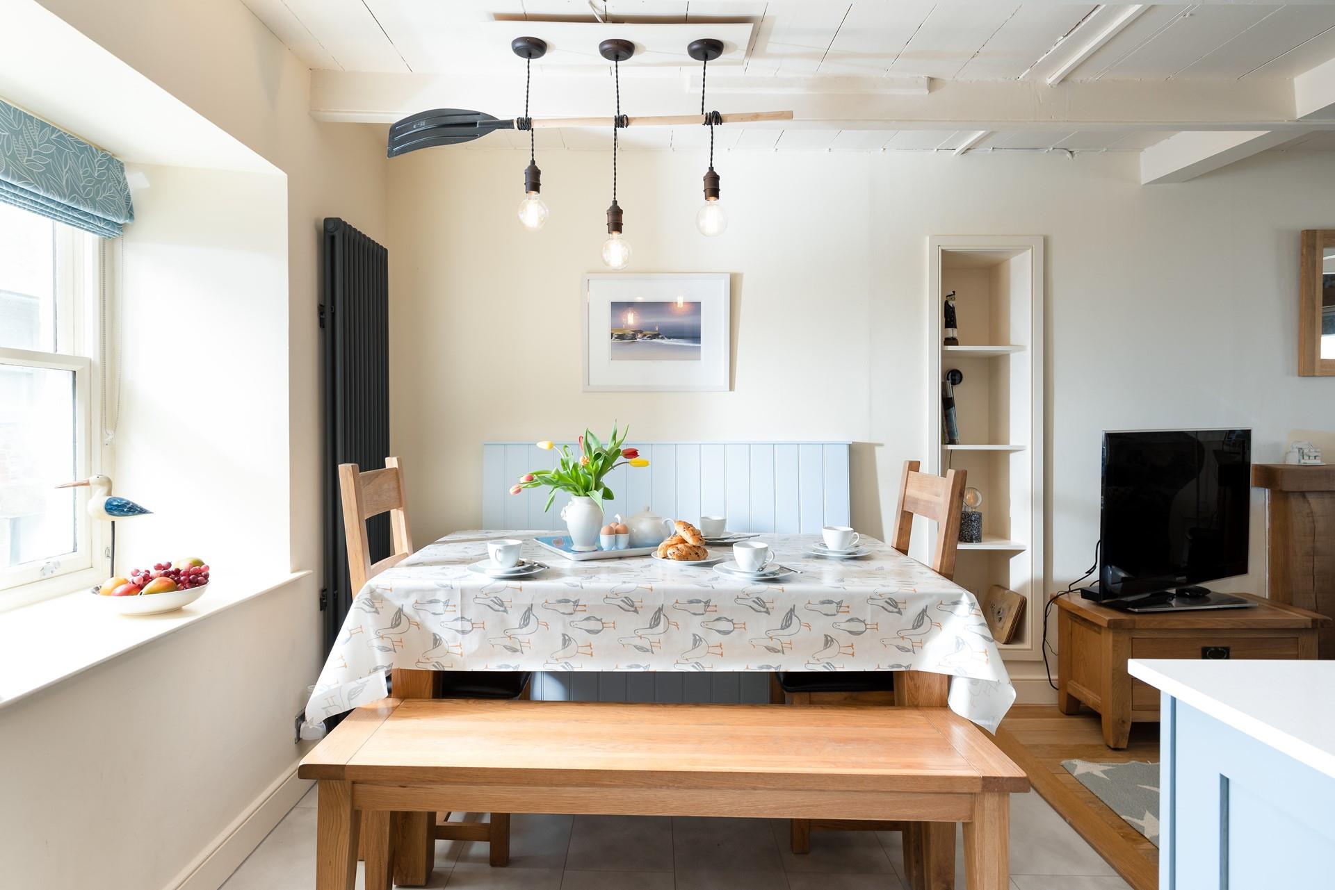 Enjoy a leisurely breakfast at the dining table, making plans for the days ahead. 