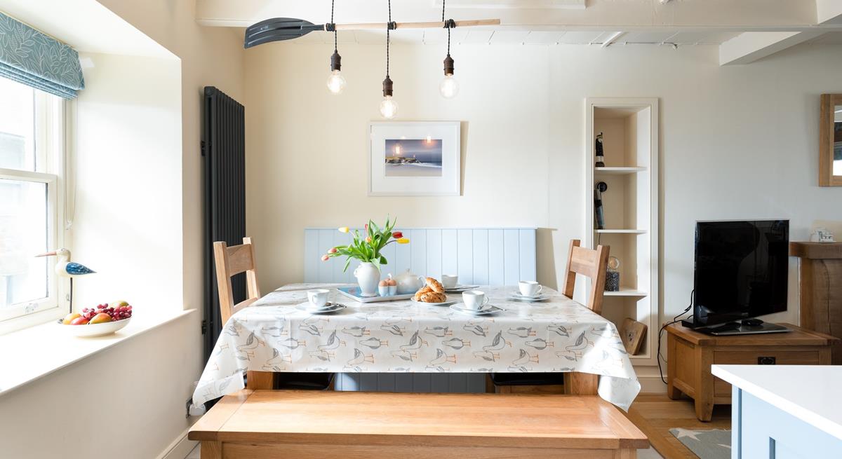 Enjoy a leisurely breakfast at the dining table, making plans for the days ahead. 