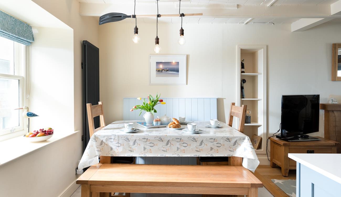 Enjoy a leisurely breakfast at the dining table, making plans for the days ahead. 