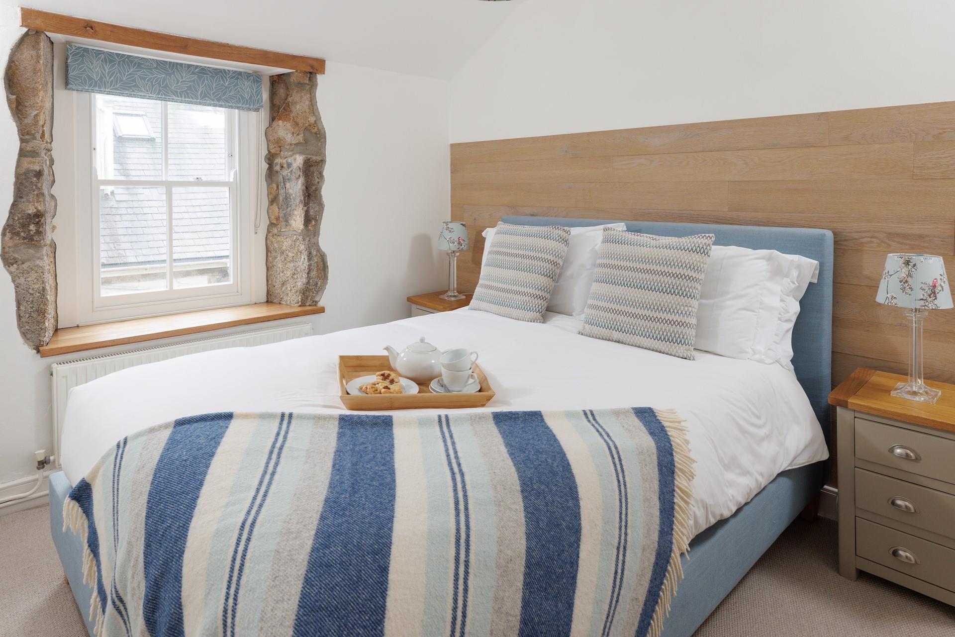Sleep in comfort in bedroom 1 after days of roaming the town.