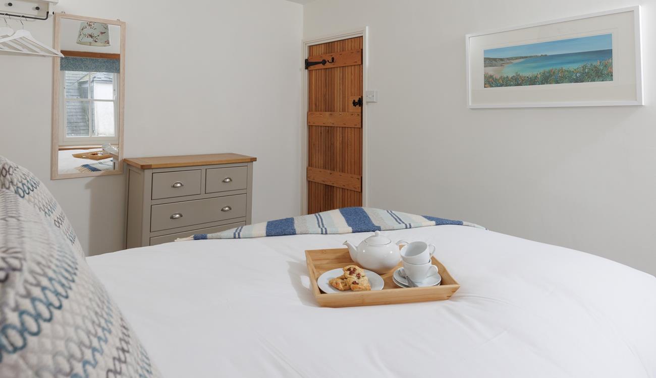 Wake up to the sound of St Ives in this bright and airy bedroom. 