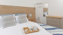Enjoy breakfast in bed whilst planning the days adventures. 