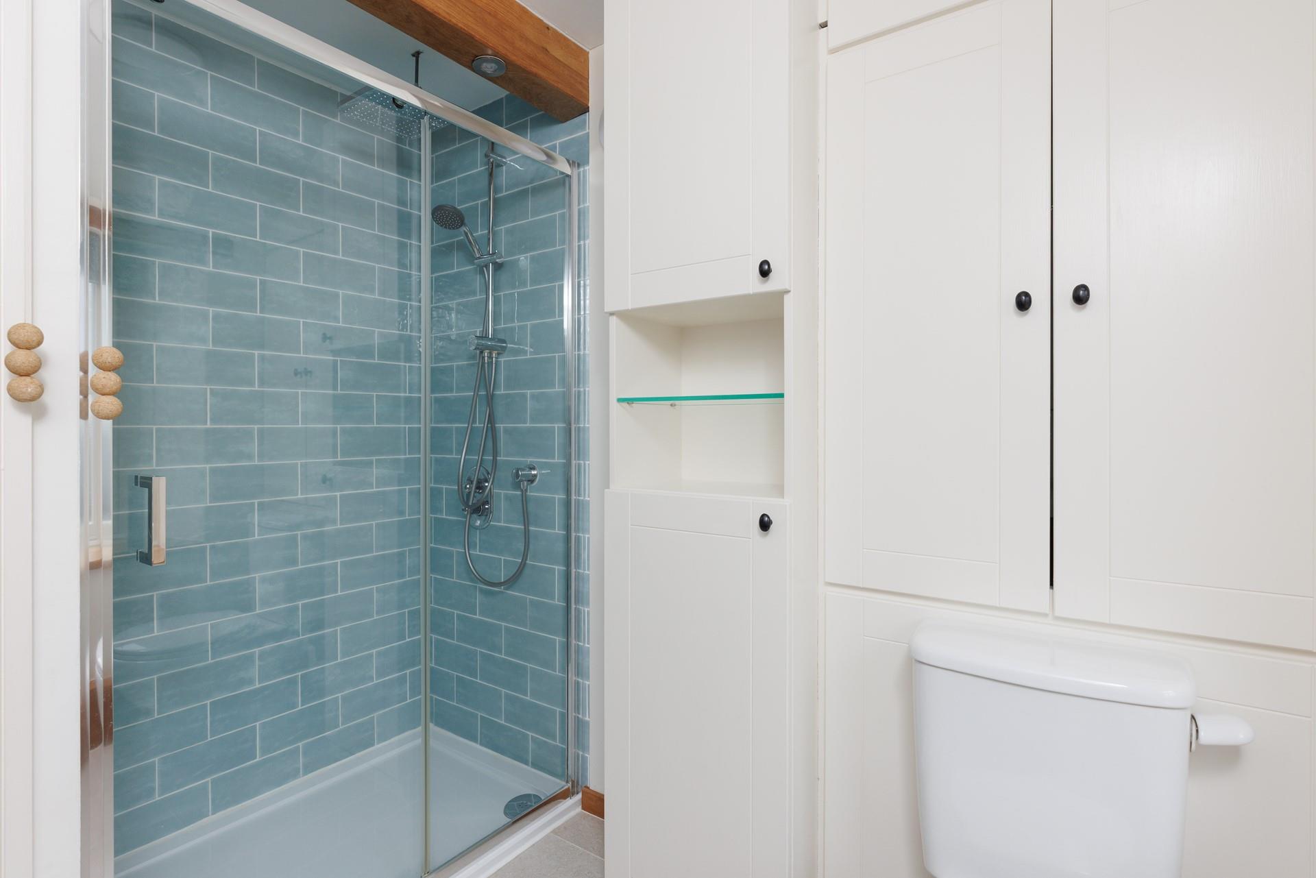 The walk-in shower is perfect for washing off the sand after a day at the beach.