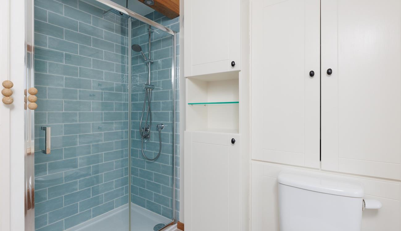 The walk-in shower is perfect for washing off the sand after a day at the beach.
