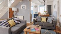 Unwind with a glass of wine in the comfort of the living area.