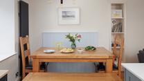 Enjoy leisurely meals at the dining table.