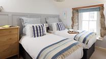 Sumptuous twin beds promise a dreamy night's sleep for guests staying in bedroom 2. 