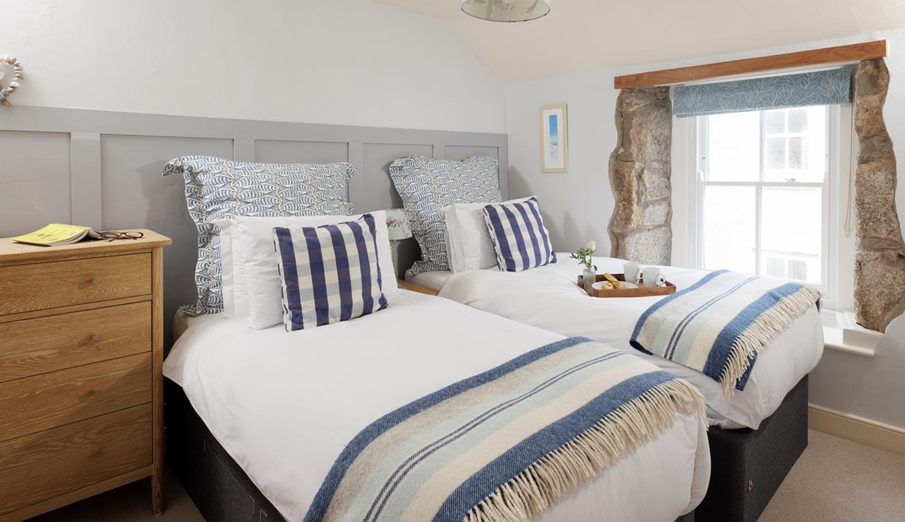 Sumptuous twin beds promise a dreamy night's sleep for guests staying in bedroom 2. 
