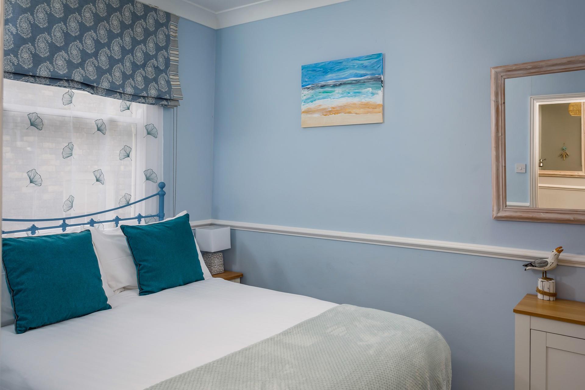 Coastal décor reflects the property's proximity to the sea. 