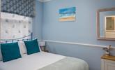 Coastal décor reflects the property's proximity to the sea.  - Thumbnail Image