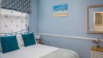 Coastal décor reflects the property's proximity to the sea. 
