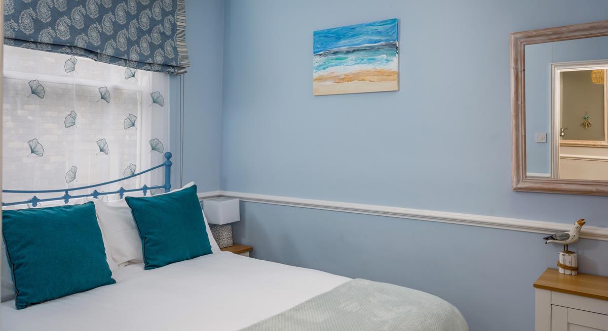 Coastal décor reflects the property's proximity to the sea. 
