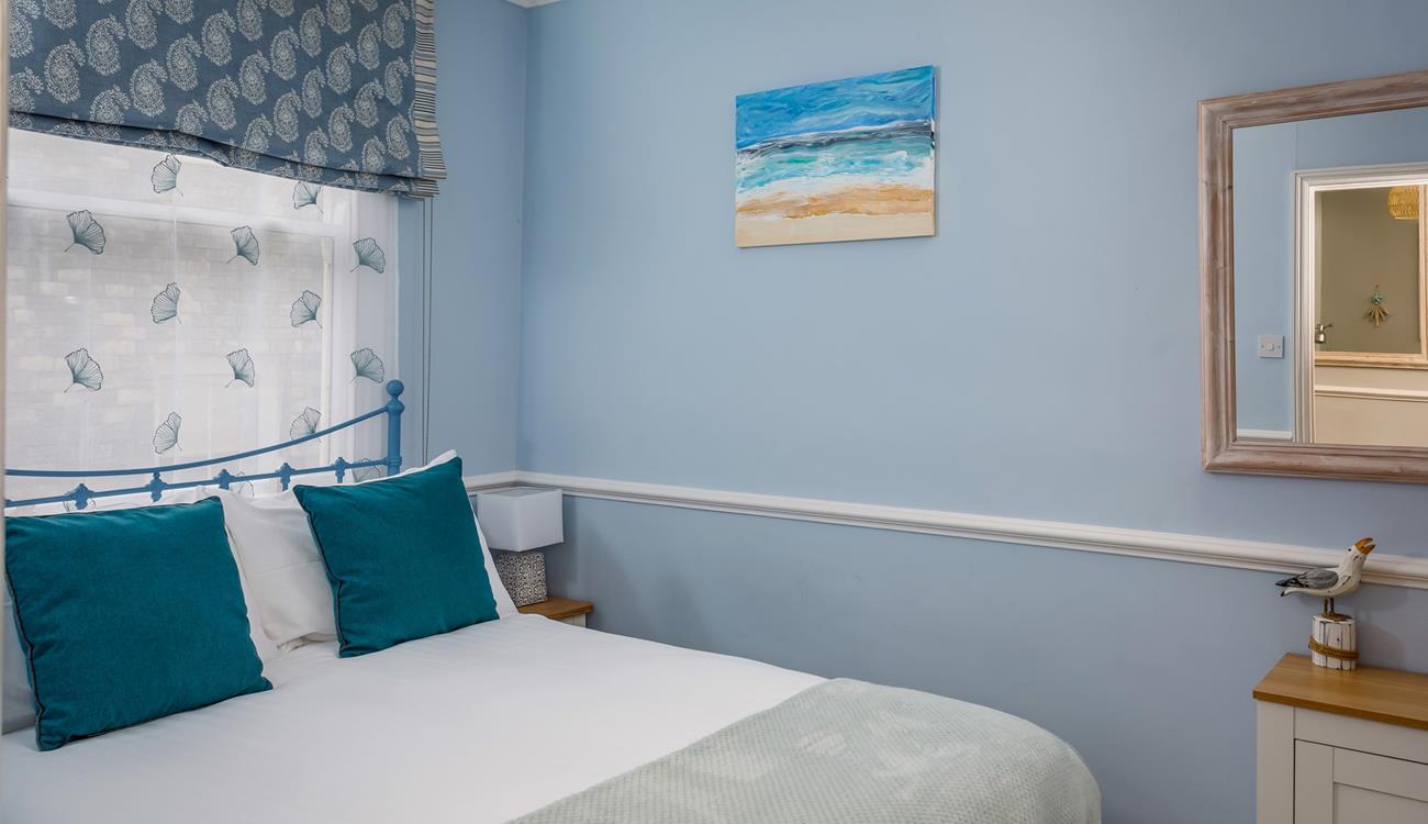 Coastal décor reflects the property's proximity to the sea. 