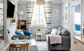 Snug and cosy, the sitting room is the perfect place to relax after a day exploring St Ives.  - Thumbnail Image