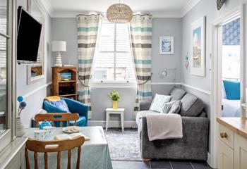 Snug and cosy, the sitting room is the perfect place to relax after a day exploring St Ives. 