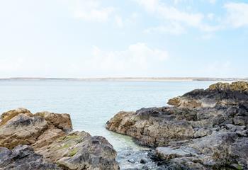 Lobster Pot is located just above the rocks that lead to the sea.