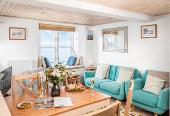 Quaint and cosy, the living area is the perfect spot to unwind after a day exploring St Ives.