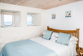 We love the port hole windows that offer far-reaching views across the ocean. 