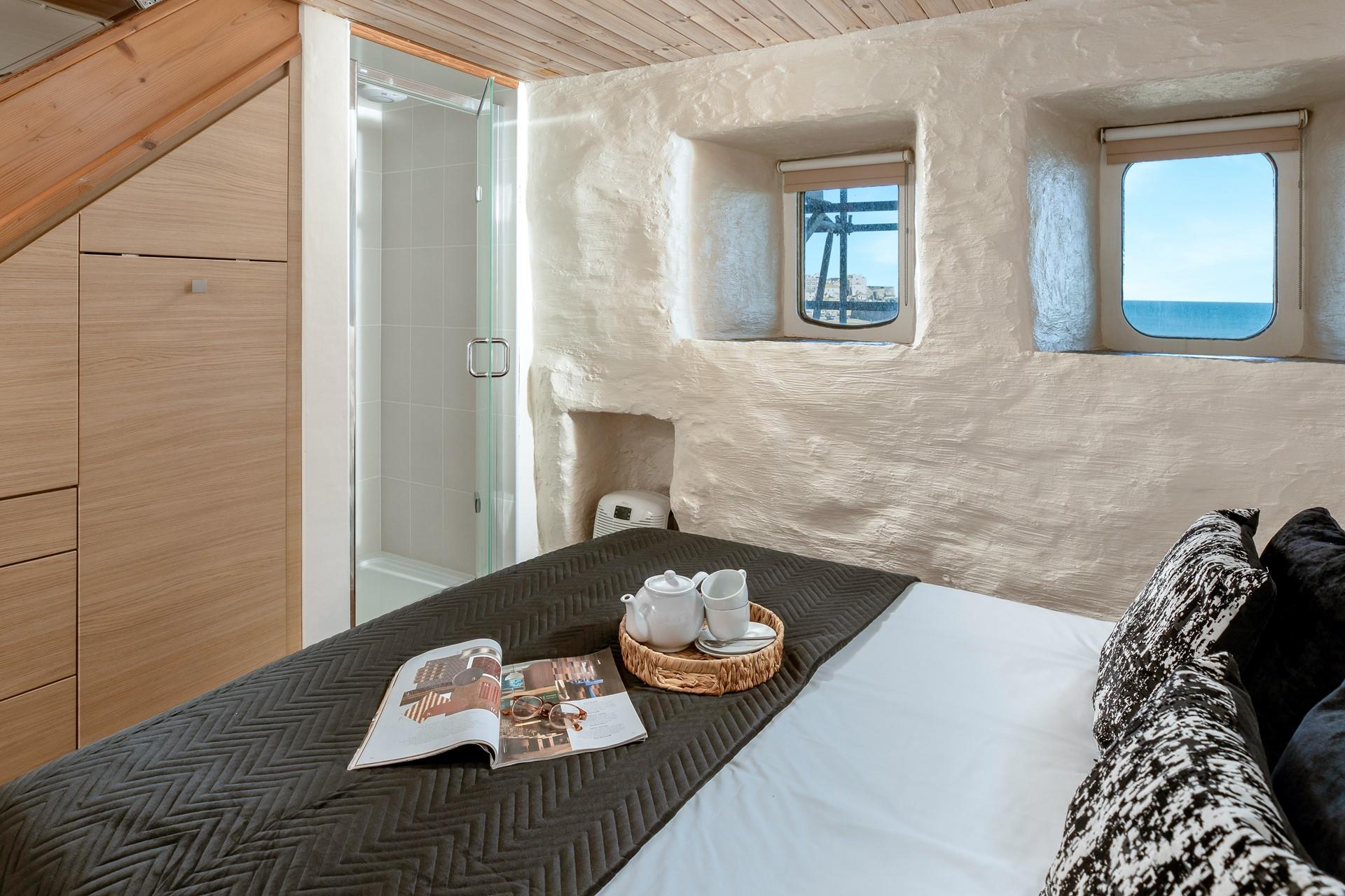 The double bedroom also features an integrated shower cubicle. 