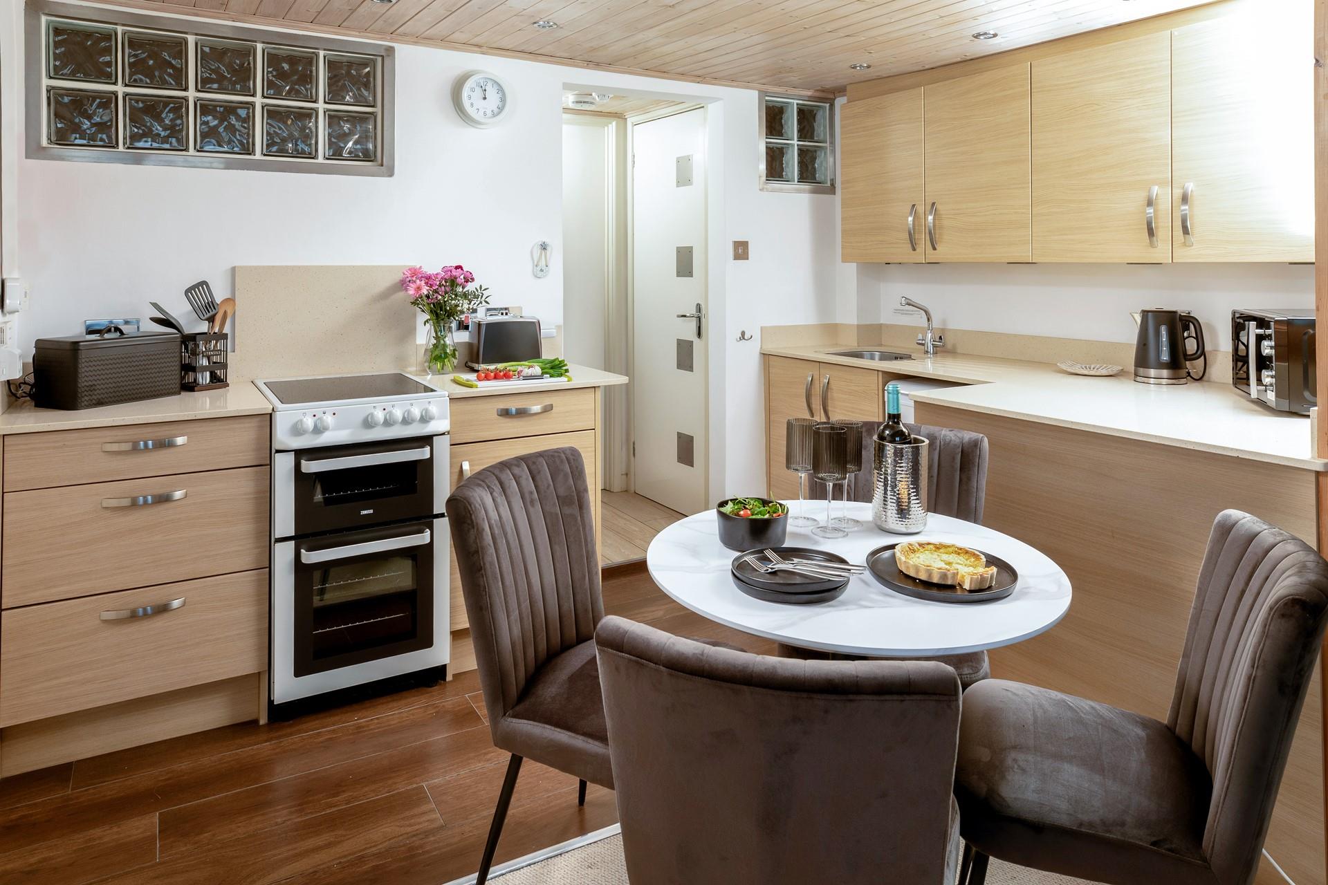 Pop the kettle on, make yourself a brew and head to the bedroom, located through the kitchen. 