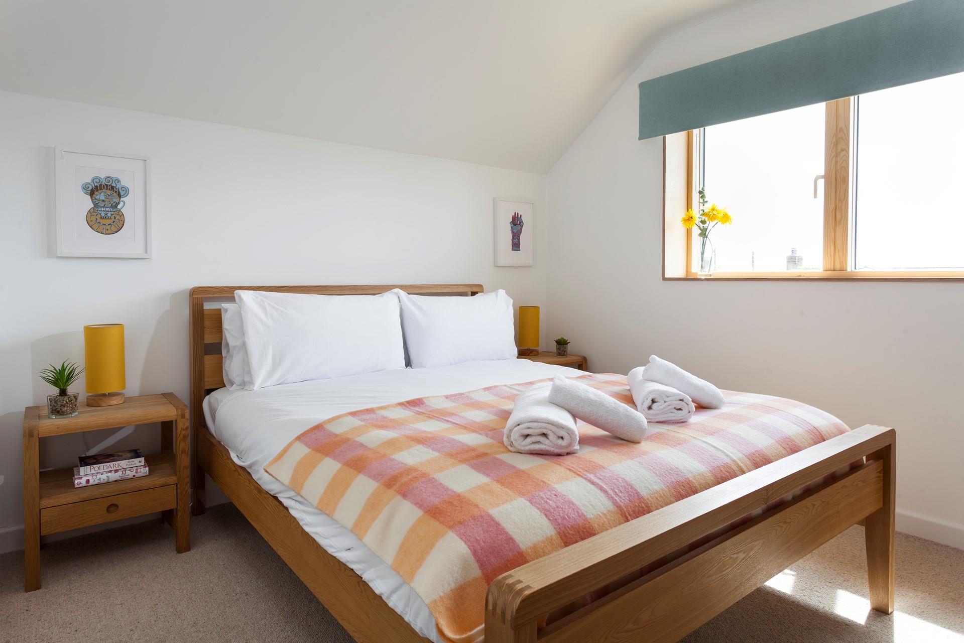 Calming and peaceful, bedroom 1 promises a blissful night's sleep. 