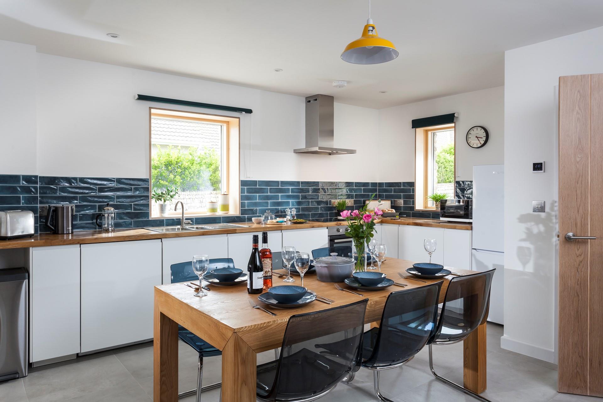 Beautifully designed, the stylish kitchen diner is perfect for family meals together. 
